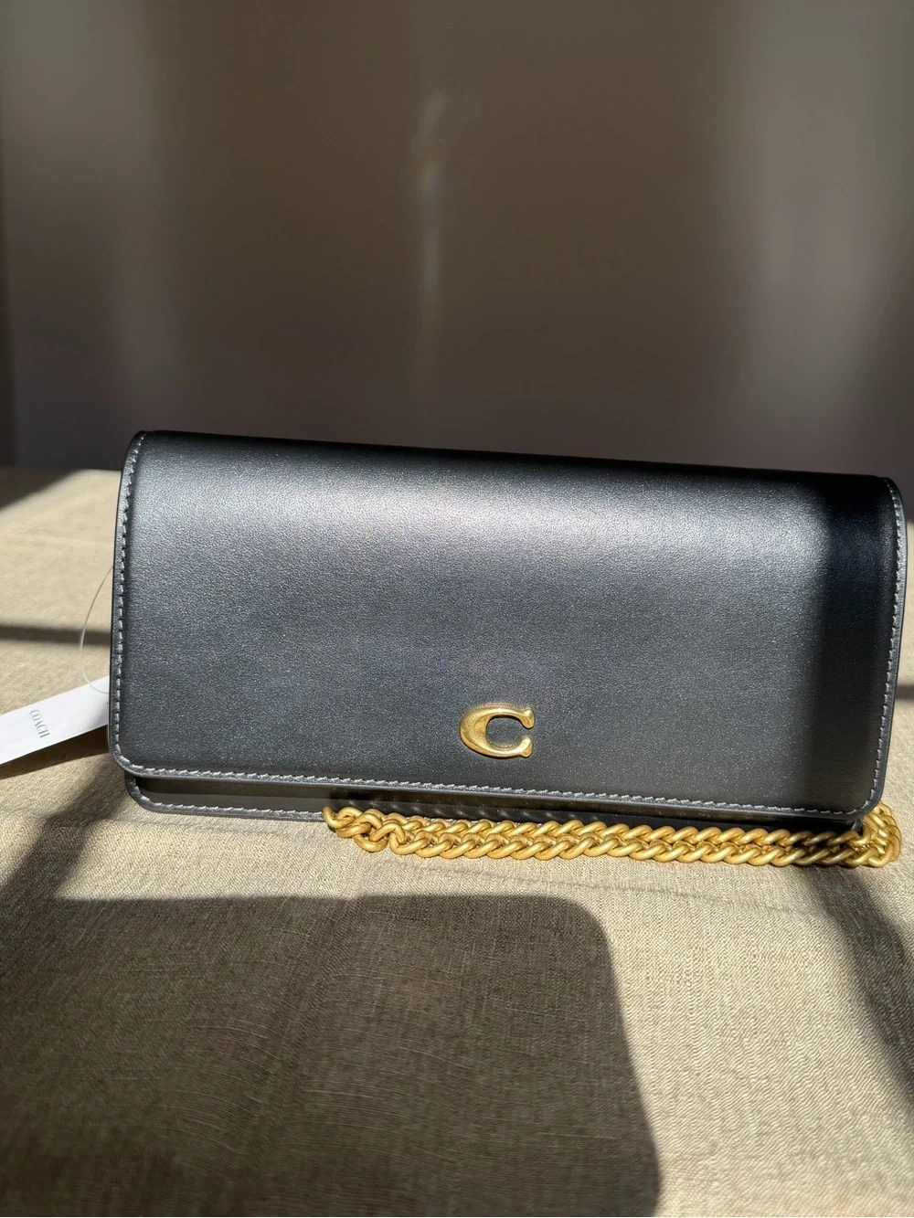 Coach sleek black